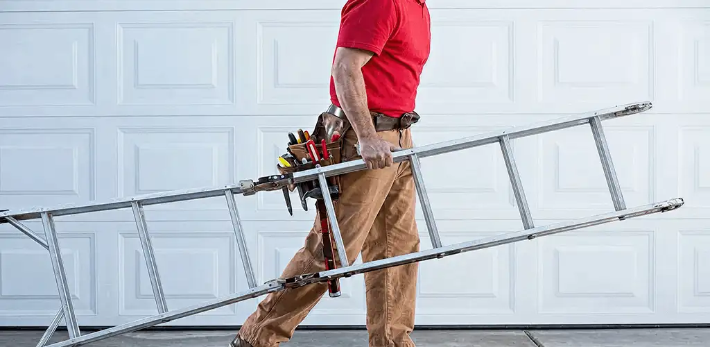 Garage door repair technician arriving with tools and ladder in Sioux Falls, SD