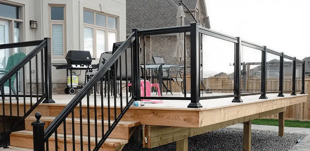 Handrail installation on a deck staircase for safety and code compliance in Sioux Falls, SD